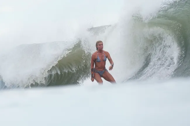 Mika surfing in Mexico